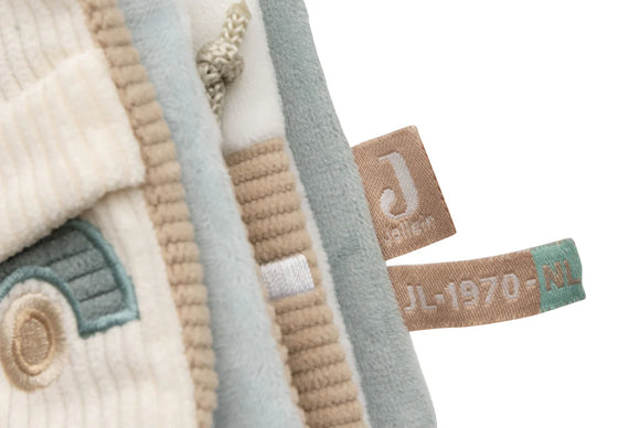 Livre d’activités bébé en tissu velours côtelé écru avec motif voiture – jouet d’éveil sensoriel à accrocher Jollein