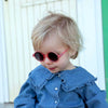 Lunettes de soleil enfant Ki ET LA Woam rose fraise à monture ronde