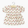 Robe Faustine pour poupées Gordis Minikane : robe à manches ballons avec imprimé Fleurs de Coton, élégante et délicate pour habiller les poupées avec style.