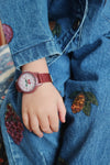 Montre enfant rouge foncé apprentissage de l’heure – motif cerise Konges Slojd
