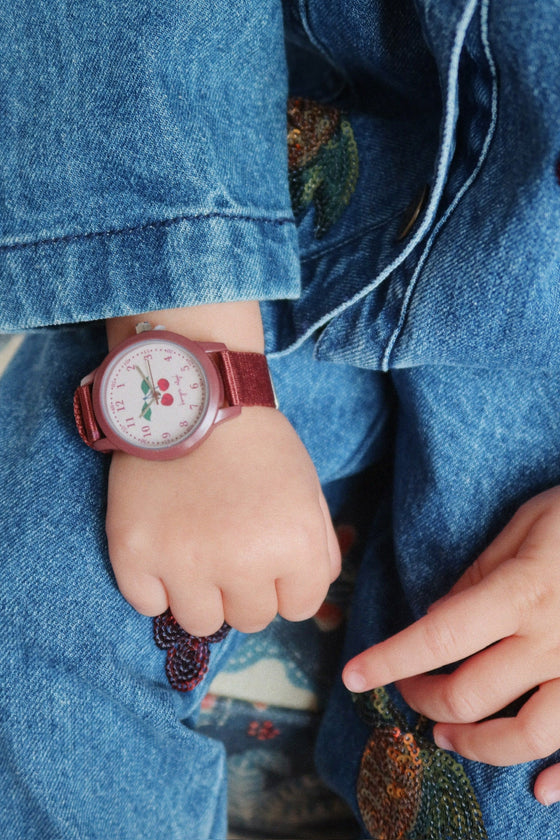 Montre enfant rouge foncé apprentissage de l’heure – motif cerise Konges Slojd