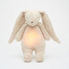 Lapin Moonie sable peluche veilleuse musicale et lumineuse bruits blancs apaisent bébé.