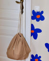 Nid Bag Teddy 2-en-1 Tante Reine Housse coussin d'allaitement et sac de rangement.