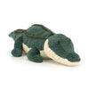 Peluche crocodile Allexi Alligator Jellycat verte posée au sol