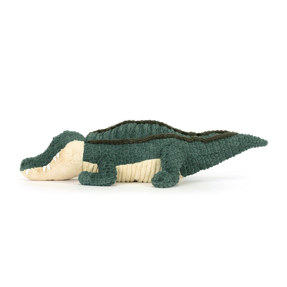 Peluche crocodile Allexi Alligator Jellycat verte posée au sol