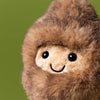 Peluche Amuseables Peanut Yeti Jellycat en forme de cacahuète avec costume de yéti marron, douce et moelleuse