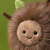 Peluche enfant marron effet bois avec feuilles et visage souriant