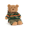 Peluche ours avec pull vert rayé et sac à dos style aventurier