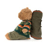 Peluche ours avec pull vert rayé et sac à dos style aventurier