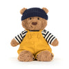 Peluche ours marin Bartholomew Jellycat avec salopette jaune et bonnet bleu
