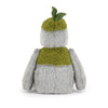 Peluche monstre gris avec détails verts et feuille style créature nature