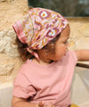 Foulard coton fleuri rose porté en bandana bébé été style bohème Jaya Rose Bluch Bëllemme.