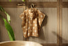 Poncho de bain réversible Jollein Teddy Bear en éponge beige avec capuche pour bébé et enfant