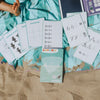 Kit complet de recharges éducatives Kidywolf sur serviette de plage