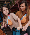 Sac banane enfant Hello Hossy Mini Indiana avec couleurs orange, bleu ciel et rose, fermeture blanche, ceinture réglable rose