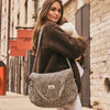 Sac à langer Bebel Middle léopard beige avec anses en tissu