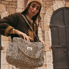 Sac à langer Bebel Middle léopard beige avec anses en tissu