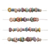 Set de grosses perles à lacer Mushie jeu de motricité fine enfant