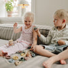 Set de grosses perles à lacer Mushie jeu de motricité fine enfant