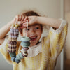 Set de grosses perles à lacer Mushie jeu de motricité fine enfant