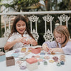 Set de grosses perles à lacer Mushie jeu de motricité fine enfant