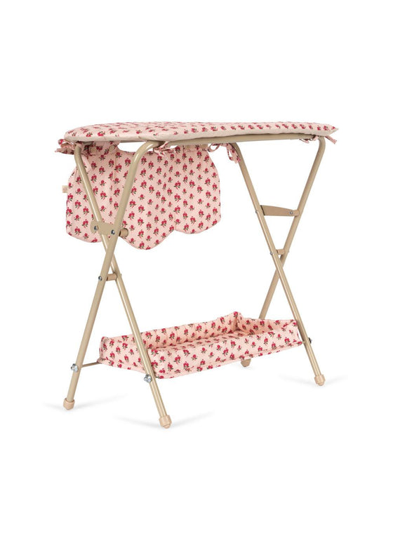 Table à langer Rosie Rose pour poupées Konges Slojd avec étagère et tissu fleuri rose