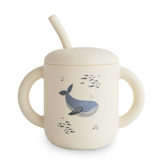 Tasse avec anses et paille en silicone motif baleine Mushie - sans BPA