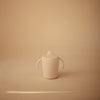 Tasse d’apprentissage avec anses et bec verseur en plastique PP ivoire Mushie – Concept store famille