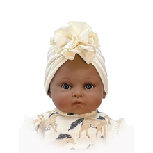  Turban fleur en jersey écru pour poupées Bambinis 47 cm Minikane